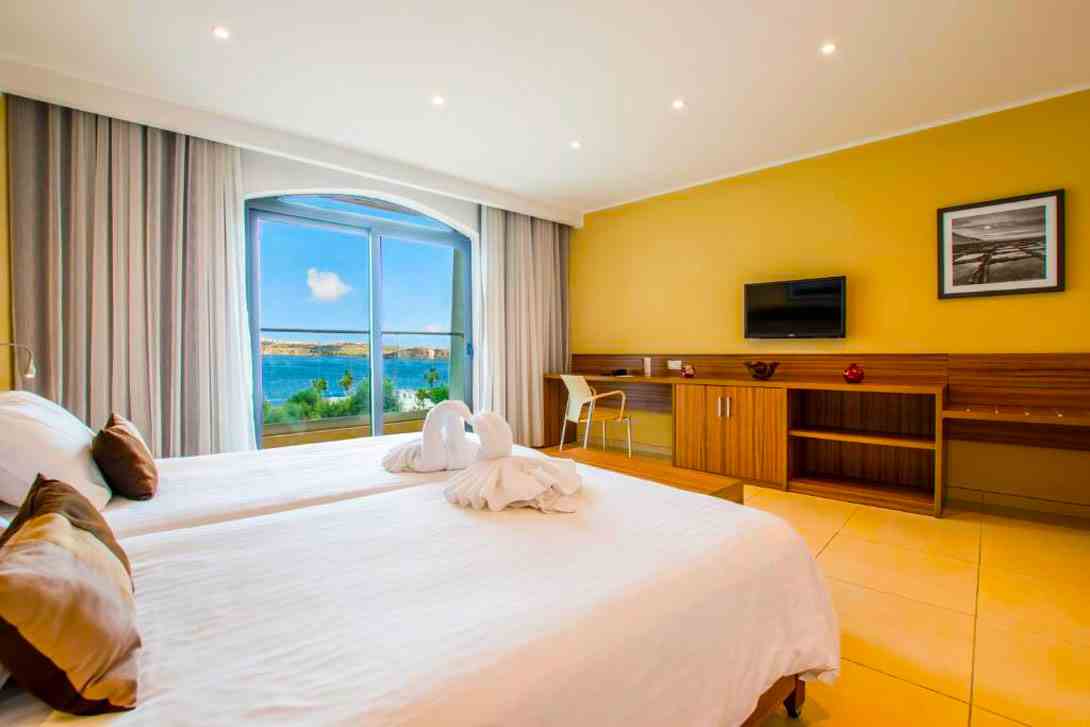 dolmen hotel superior bedroom interior malta
